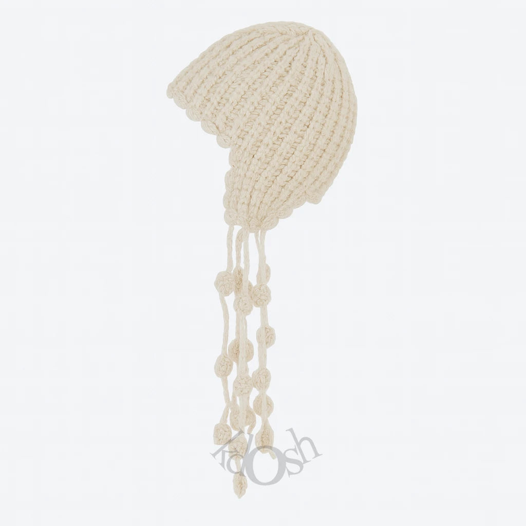 GORRO DE PUNTO CON DETALLES DECORATIVOS