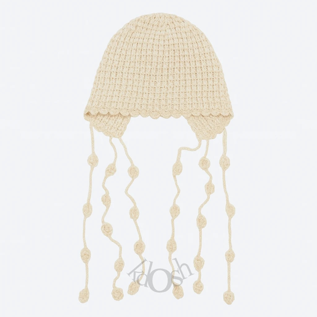 GORRO DE PUNTO CON DETALLES DECORATIVOS